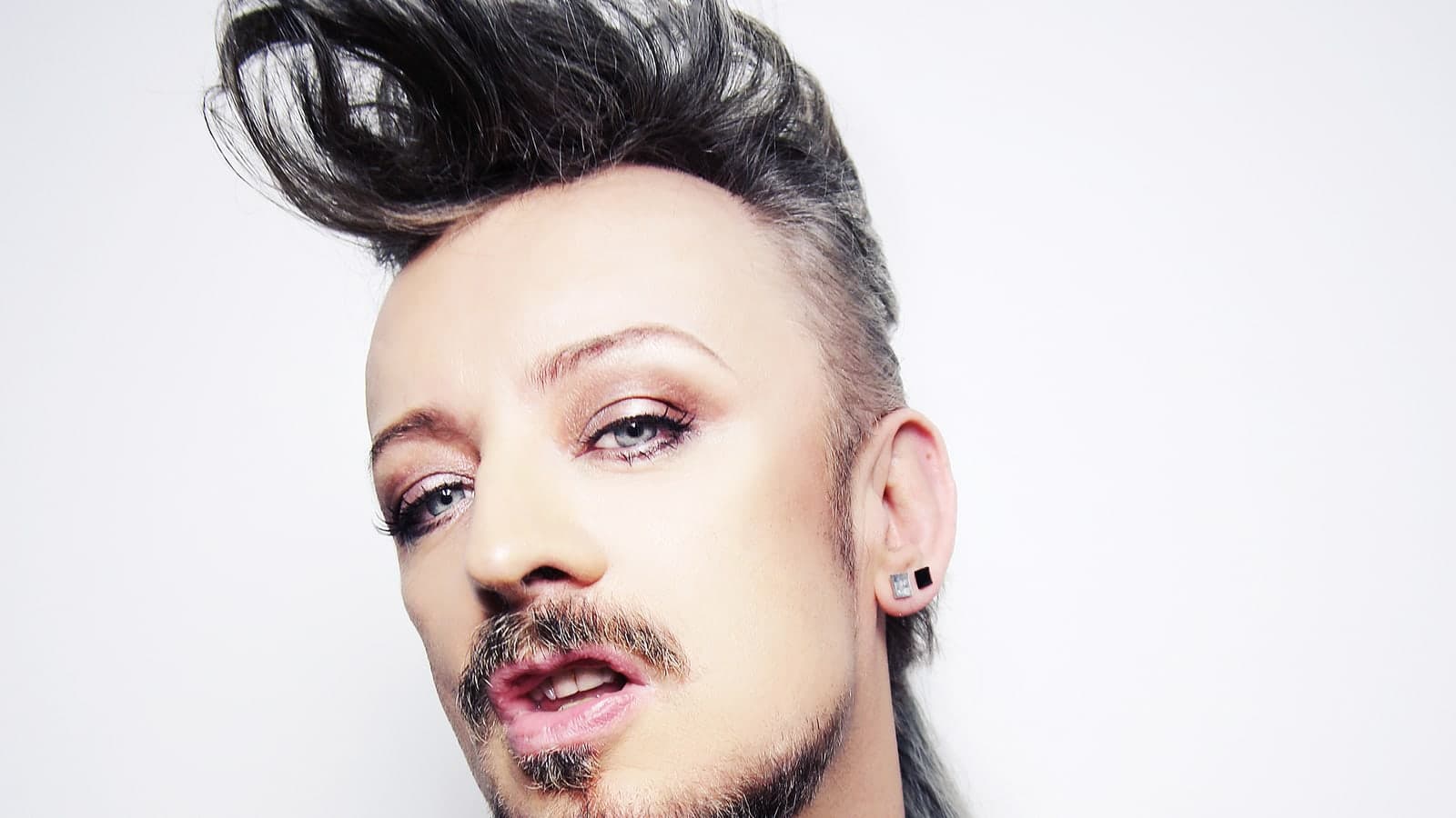 Musician Boy George photographed at an event in 2013