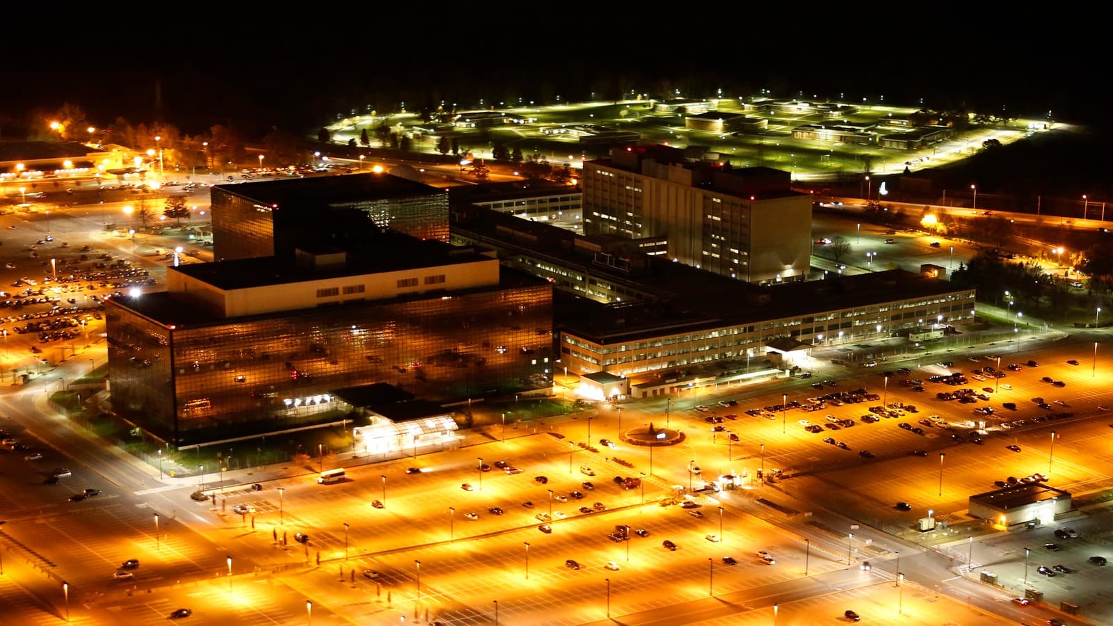 The National Security Agency headquarters at Fort Meade, photographed from the air at night.