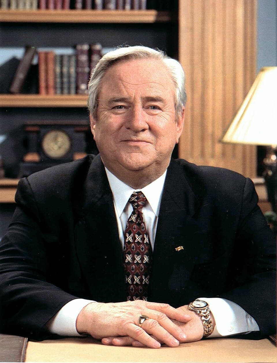 Jerry Falwell Sr. seated in an office
