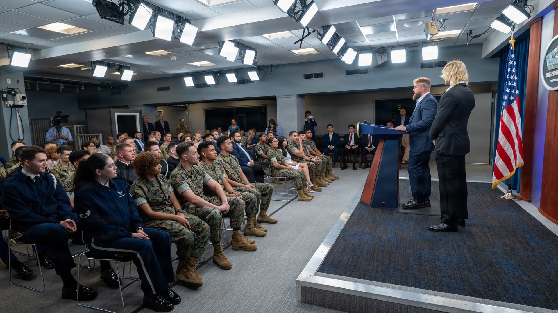 Jake and Logan Paul speaking to service members during a Pentagon visit.