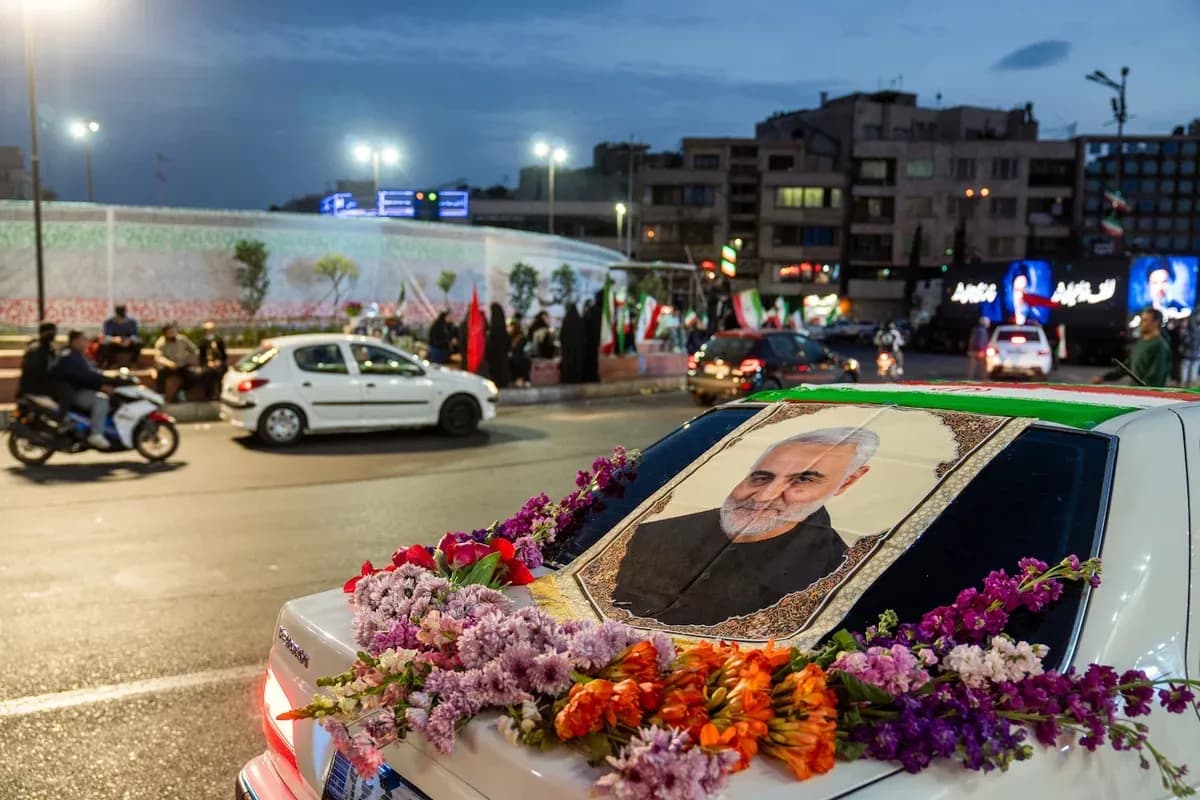 Car decorated with floral tributes and a portrait of Iranian Maj. Gen. Qasem Soleimani