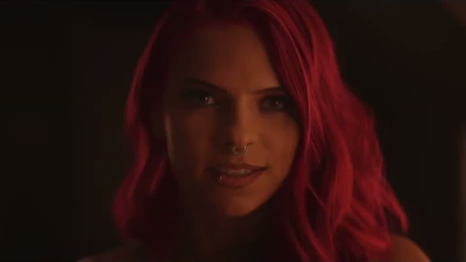 A red-haired woman appears in Steve Hilton's "Just Try It" campaign advertisement.