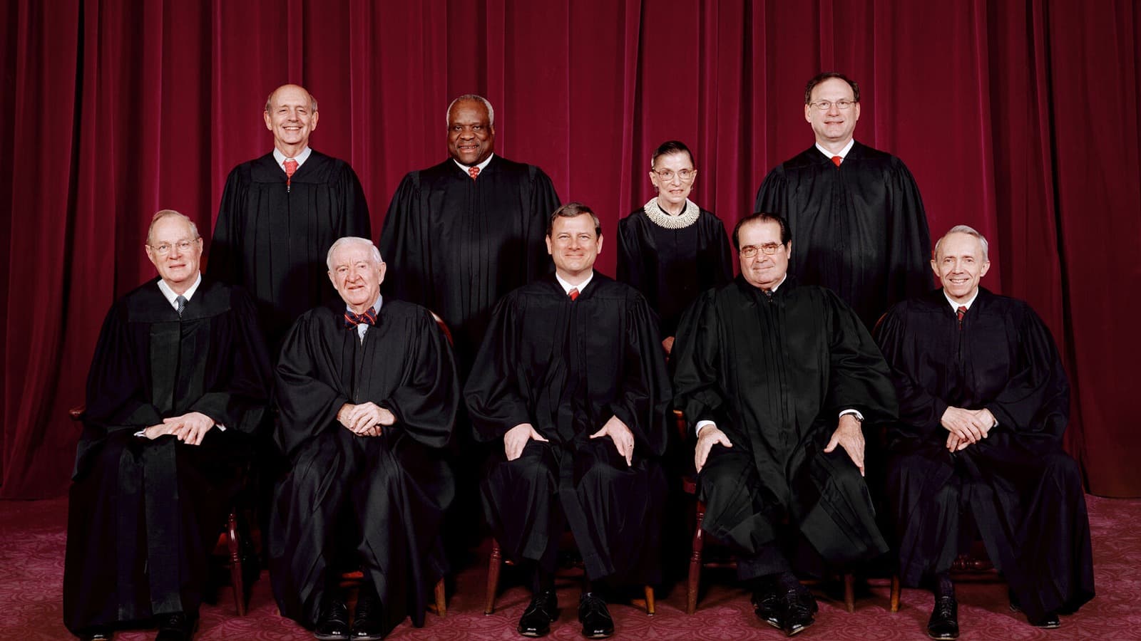 The nine U.S. Supreme Court justices pose for their 2006 group photograph.